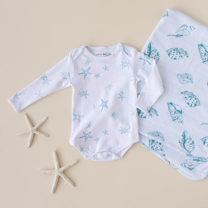 STARRY TIDE LONG SLEEVE BODYSUIT  A favorite from first wear